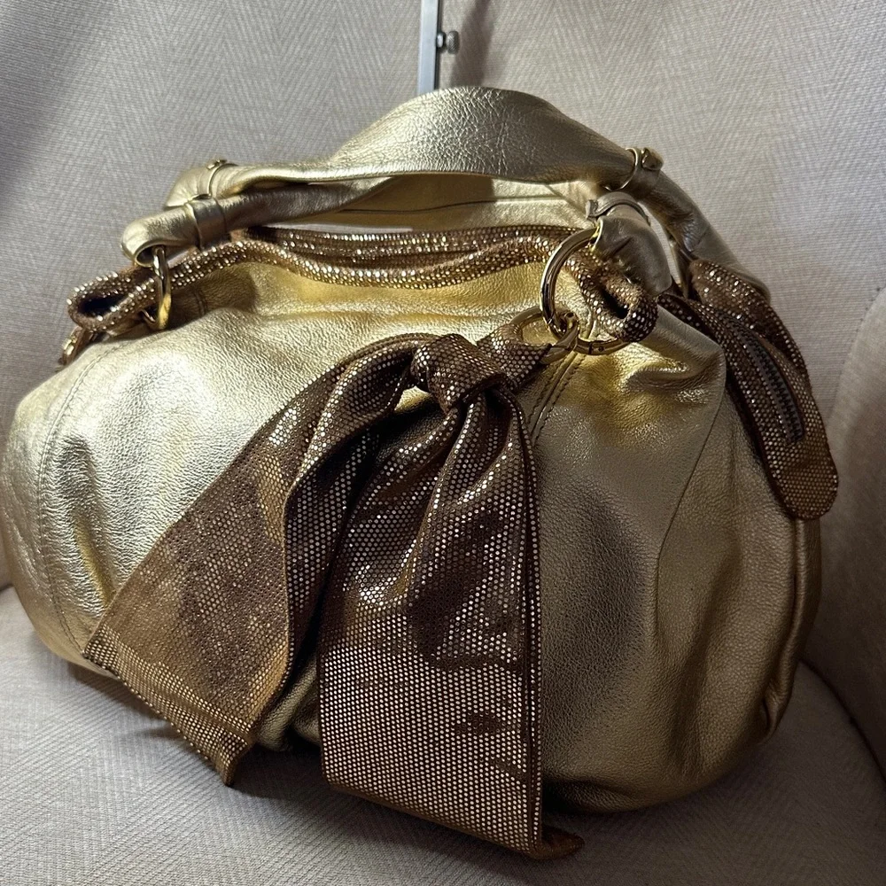 Sofia C. Luxurious Gold Shoulder Leather Bag with Leather Bag Charm